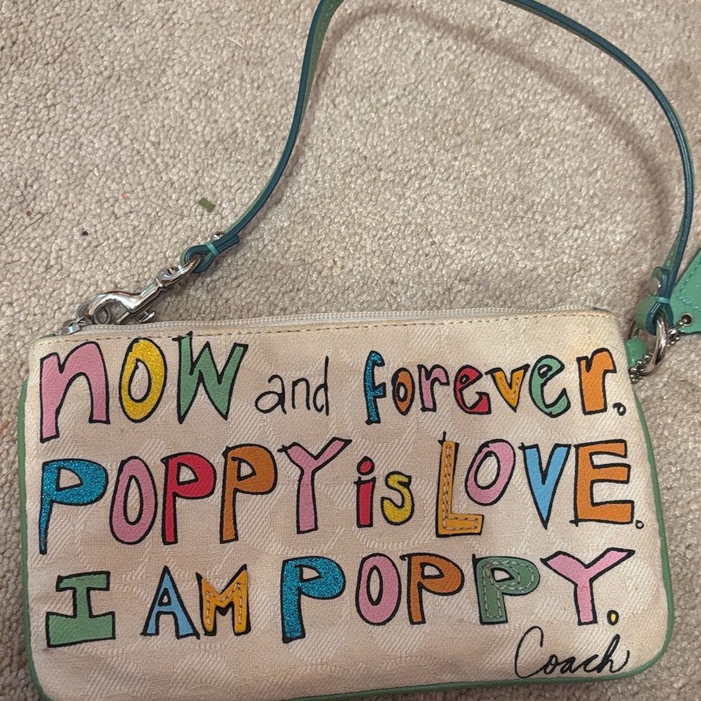 Coach Multicolor Text Wristlet with Green Strap